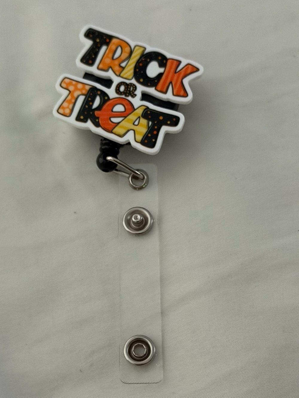 Trick or Treat Orange & Black Badge Reel Card Holder